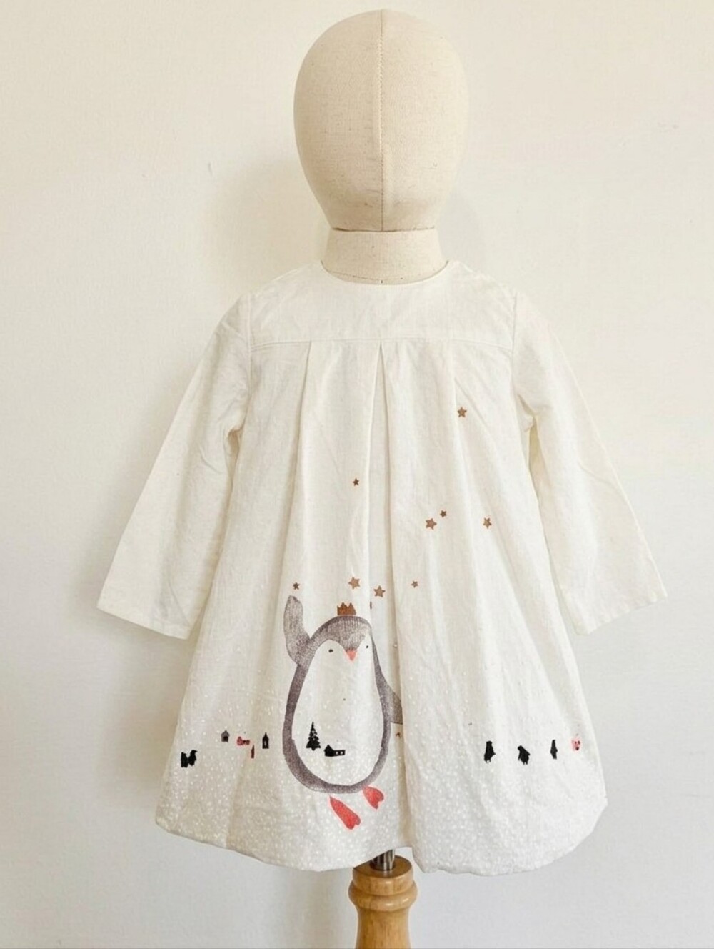 Catimini Off White Corduroy Dress W/Pleats & Penguin Detail. 12 Months